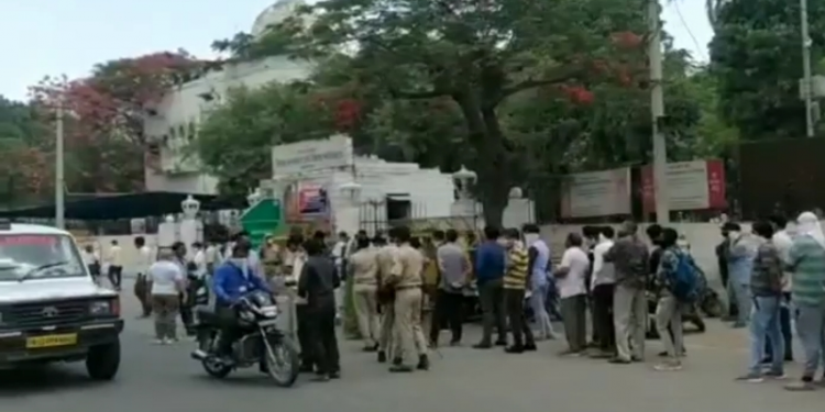 people gathered at collectry for lockdown pass