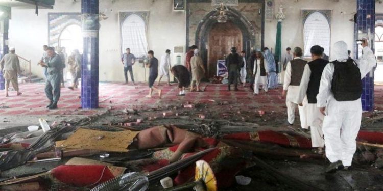 suicide bomb attack at mosque in kunduz afghanistan more than 50 dead in blast
