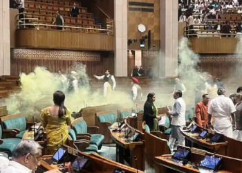 parliament smoke attack two man jumped in to lok sabha from visitors gallery and spread smoke